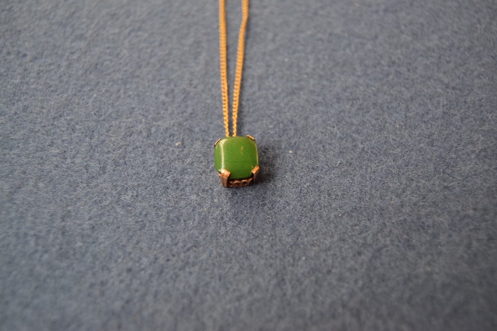 A 20th century 9ct gold and green hardstone cabachon pendant necklace, - Image 2 of 2