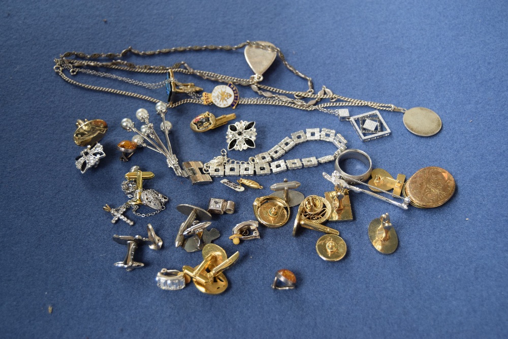 A mixed lot of jewellery including several pairs of cuff links,