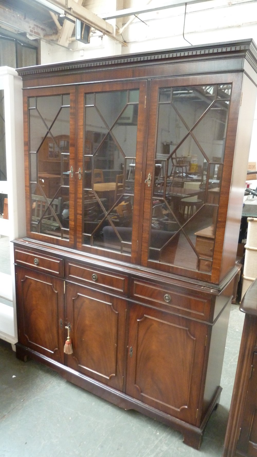 A 20th century mahogany dresser, glazed doors over three drawers and three panelled cupboards, - Image 2 of 2