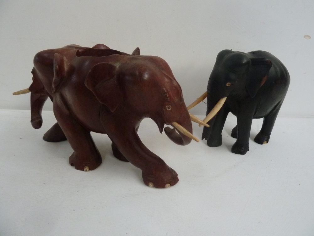 Two wood and bone carved elephant figurines (2)