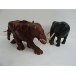 Two wood and bone carved elephant figurines (2)