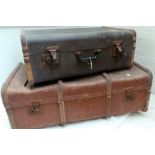 Two vintage canvas and wood strapped trunks. Large one 90 x 49 x 33cm. Smaller 69 x 44 x 26cm.