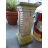 A composite stone pot stand in the form of a classical column 60cmH