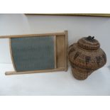 A vintage washboard with a wicker basket and cover with carved handle in the form of a turtle (2)