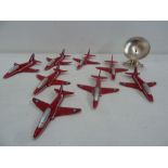 A group of 8 Red Arrows 85mm long with magnetic strip to base and a satellite dish