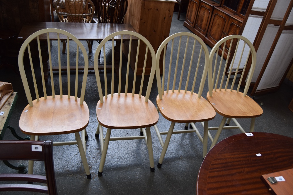 A set of four stick back painted pine kitchen chairs (4)