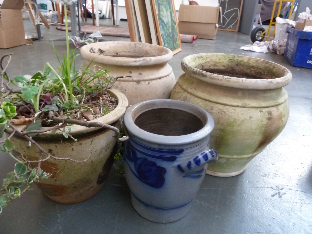 Three stoneware planters together with a German style salt glazed pot