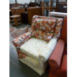 A wingback armchair in floral covers