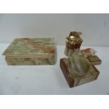 An onyx smoking set including a lighter,