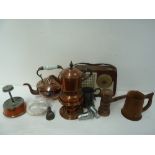 A box of mixed metal items, including a copper kettle with ceramic handle on stand with oil burner,