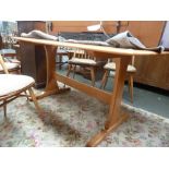 An Ercol light elm kitchen table 50cmW