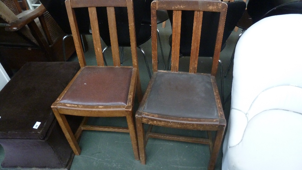 Two 1940's dining chairs with brown leather drop in seats (2)