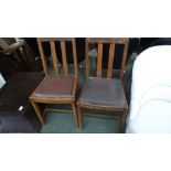 Two 1940's dining chairs with brown leather drop in seats (2)