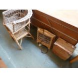 A childs wicker chair with another wicker seat,
