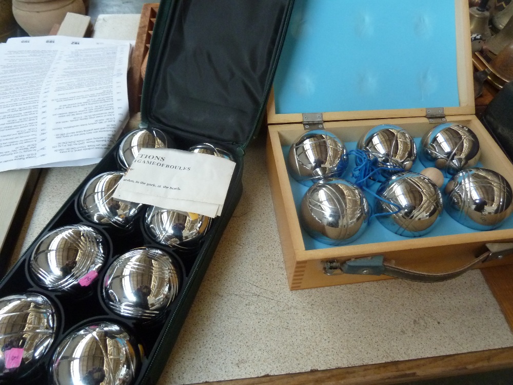 Two sets of Boules in cases