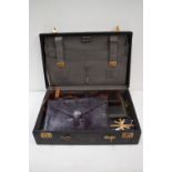 A 20th century leather embossed briefcase,