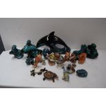 A collection of figurines including Poole pottery, Beswick,