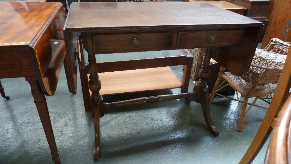 A 20th century mahogany sofa table by Strongbow Furniture,