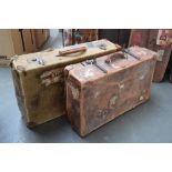 A vintage Revelation suitcase (60cm L) with travel stickers and one other canvas travel case (65cm