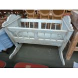 A 19th century Continental painted cradle 97cmL