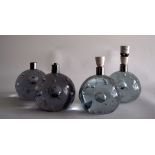 A set of four glass bubble lamps with chrome fittings for electricity,