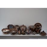 A quantity of oriental decorative china including ginger jars, various bowls and plates,