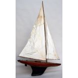 A model sailing boat with weighted lead keel, 90cm long,