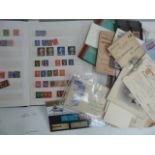 Two small albums of British stamps together with a number of first day covers and paperwork from