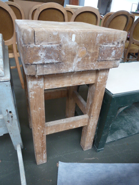 A pine square butchers block of customary form 83cmH