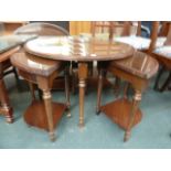 A nest of four corner tables, leather tops with glass inlay, on fluted tapering legs and undershelf,