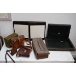 A wartime canvas binocular case, leather compass case,