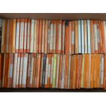 A box of vintage Penguin paperbacks with works by authors such as Oscar Wilde