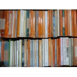 A box of vintage Penguin books with works by Graham Greene etc.