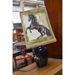 An Elliot and Spear ceramic lamp with hand painted shade with horse motif