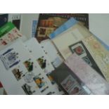 A collection of stamps and first day covers including Royal Mail Mint Stamps Collectors Packs 1983,