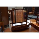 An early 19th Century mahogany toilet mirror,