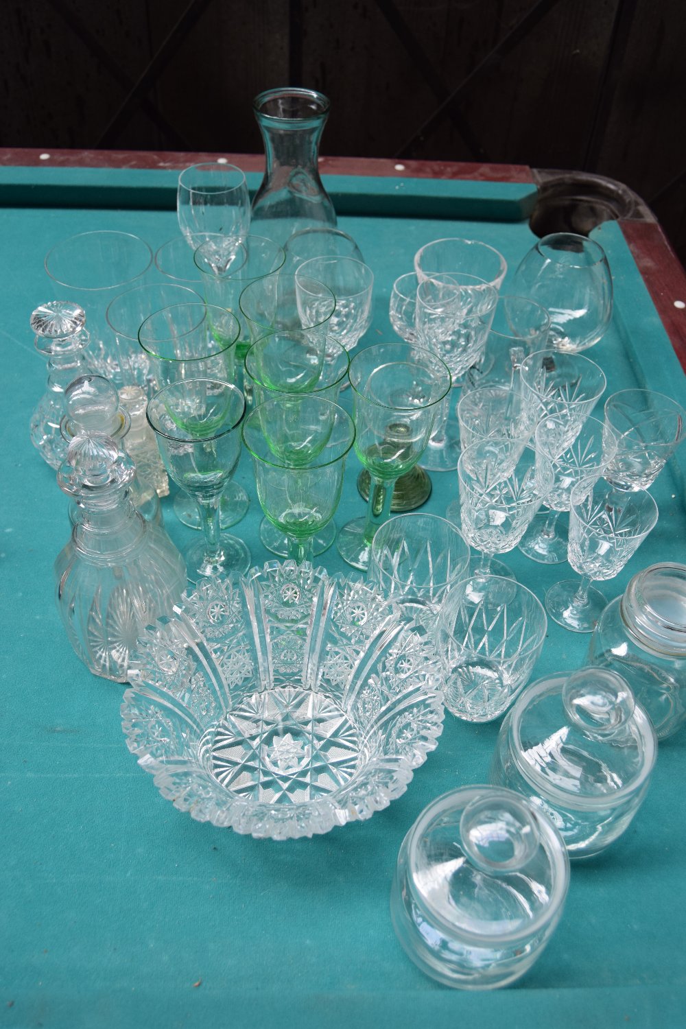 A selection of glassware including wine glasses, bowls,