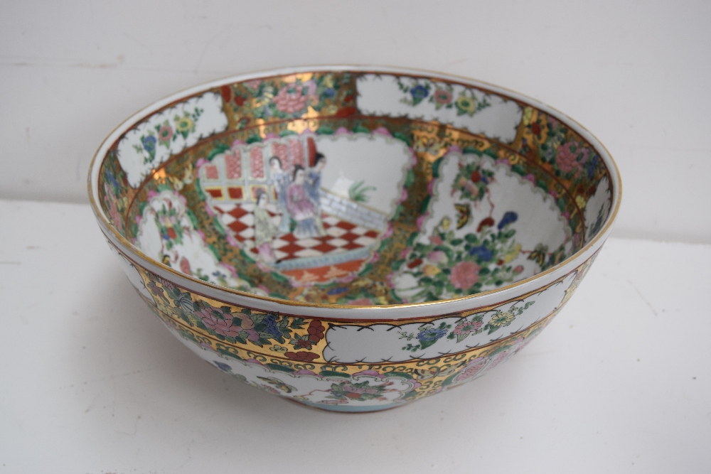 A large famille rose serving bowl in typical palette decorated with floral, - Image 2 of 4