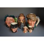 A small collection of Toby jugs including Royal Doulton 'The Poacher' (6)