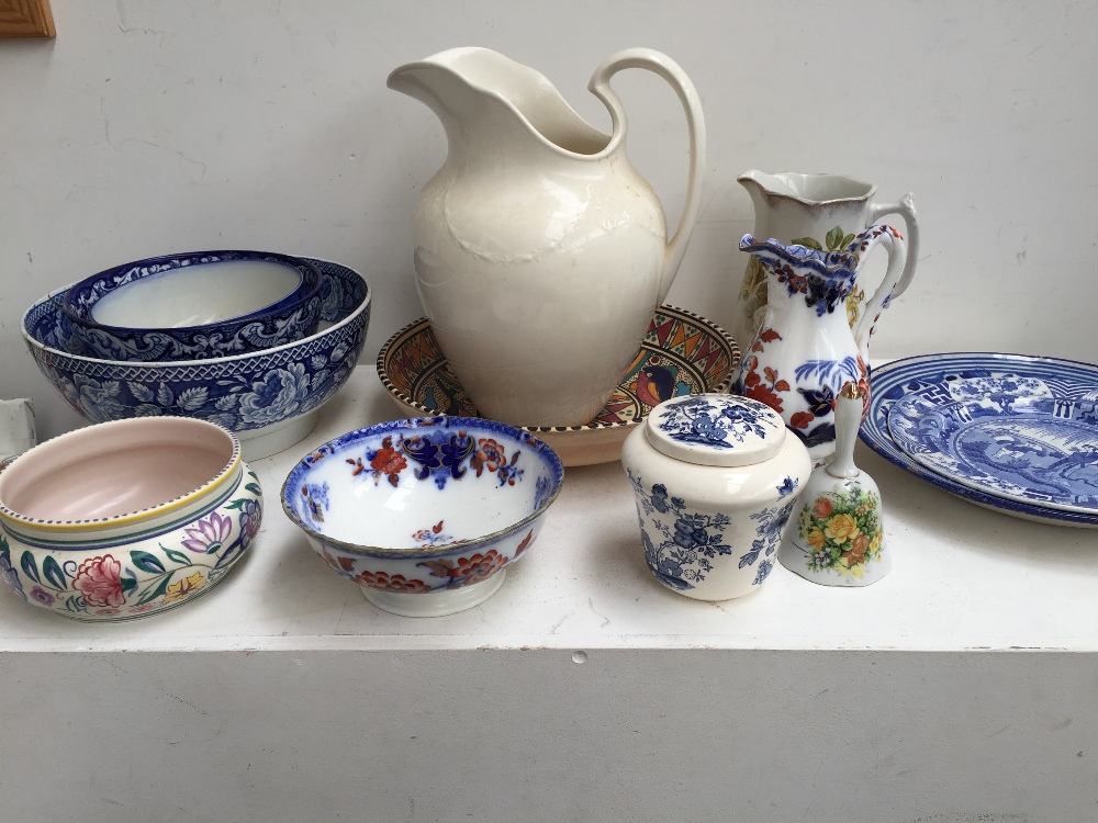 A selection of china including a Regency pearlware blue and white bowl, a Wedgwood cream water jug,