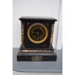 A 20th century French slate and marble mantel clock, the black dial with Roman numerals,