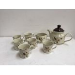 A selection of Royal Doulton tableware Wild Cherry pattern including a teapot with lid, six teacups,