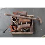 A box of assorted tools including two early 20th century plane,