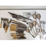 A small quantities of cutlery and flatware including a Victorian carving set with Ivory handles