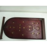 A vintage Pin Bagatelle board together with a wooden embroidery stretcher/frame