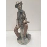 A Lladro figurine of an vagrant with violin 35 cm height