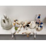 A selection of ceramic animals ornaments mostly ducks and swans including one signed H Lloyds at