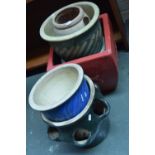 A quantity of terracotta plant pots of various sizes