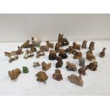 A quantities of Wade whimsies miniature some in boxes, including giraffe, elephant ,