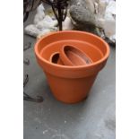 Three terracotta plant pots in various sizes 44cmD,